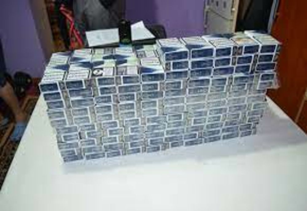 Percheziţii la Giurgiu la persoane bănuite de contrabandă de ţigarete