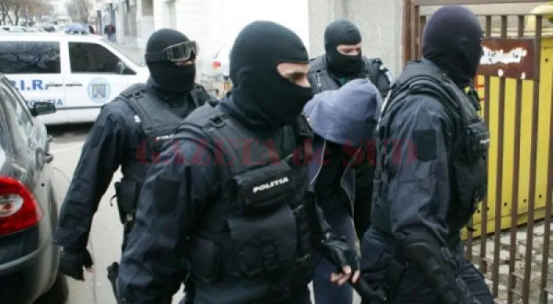 percheziții