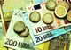 Comisioane mai mici pentru banii trimiși din România în țările din zona euro