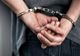 Două persoane, condamnate pentru luare de mită și cumpărare de influență, prinse de polițiști și duse în penitenciar 